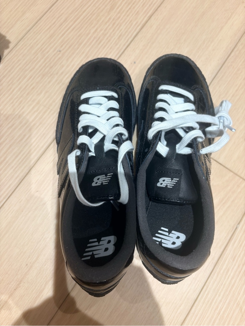 New Balance Kids Black and White Lace-Up Sneakers